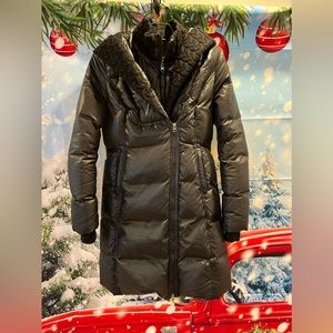 Mackage down coat with leather trim and sweater edge in prestine condition.